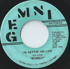 Wombat (3) : I'm Gettin' On Life  (7", Single)