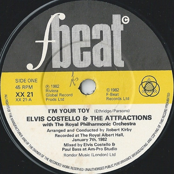 Elvis Costello And The Attractions* With The Royal Philharmonic Orchestra* : I'm Your Toy (7", Single)