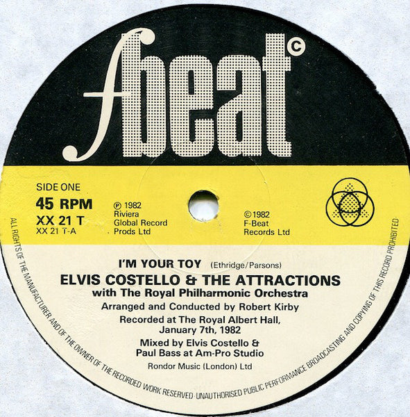 Elvis Costello And The Attractions* With The Royal Philharmonic Orchestra* : I'm Your Toy (12", Single, Ltd)