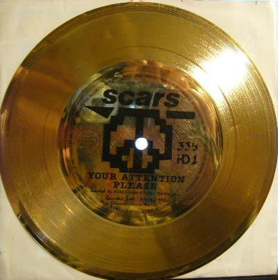 Scars (2) : Your Attention Please (Flexi, 7", S/Sided, Gol)
